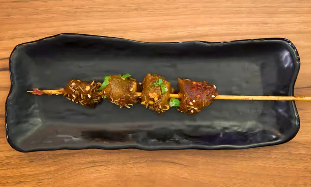 Grilled beef skewer sprinkled with spices at Top SF BBQ, a Barbecue Restaurant in San Francisco