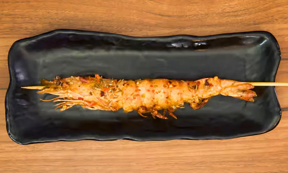 Seasoned grilled prawn skewer with chili spices at Top SF BBQ, a Barbecue Restaurant in San Francisco