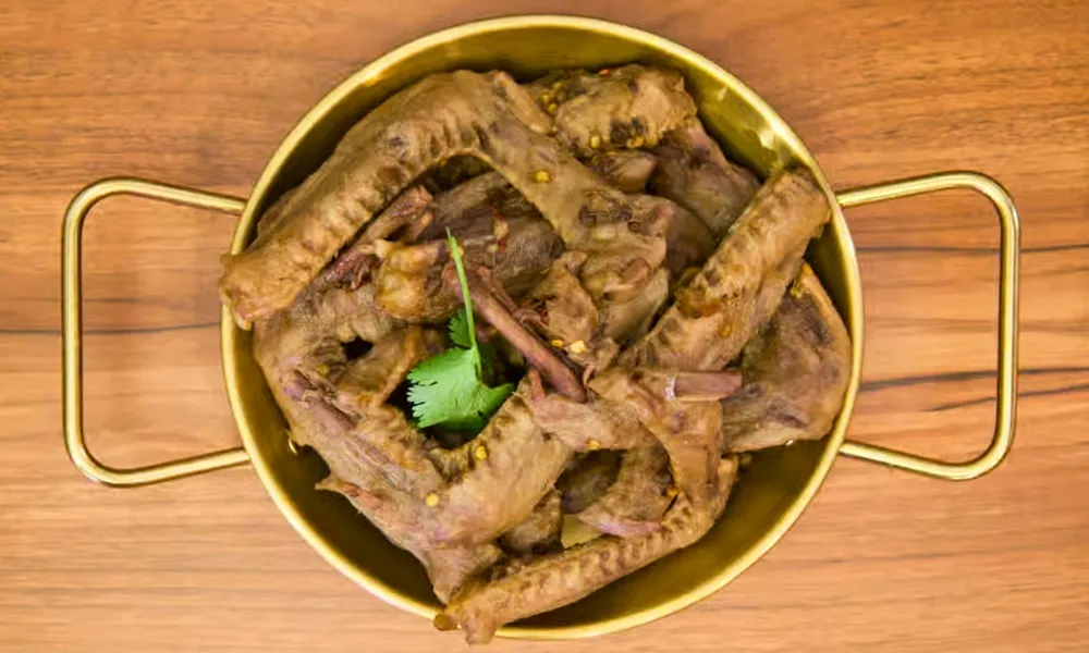 Spiced braised duck wings with fresh cilantro at Top SF BBQ, a Barbecue Restaurant in San Francisco