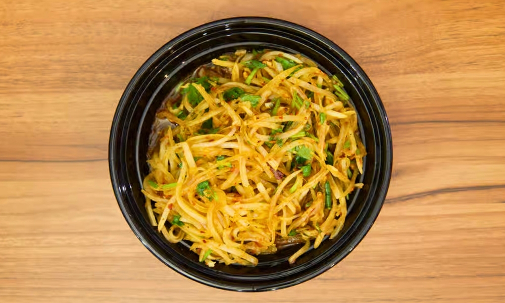 Spicy cold shredded potato salad at Top SF BBQ, a Barbecue Restaurant in San Francisco